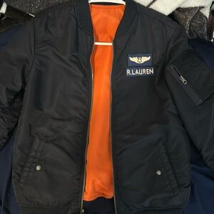 Polo Jacket, kids size, double sided navy blue color and orange.